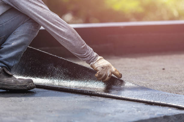 Professional Waterproofing technician working in Vernon, MI